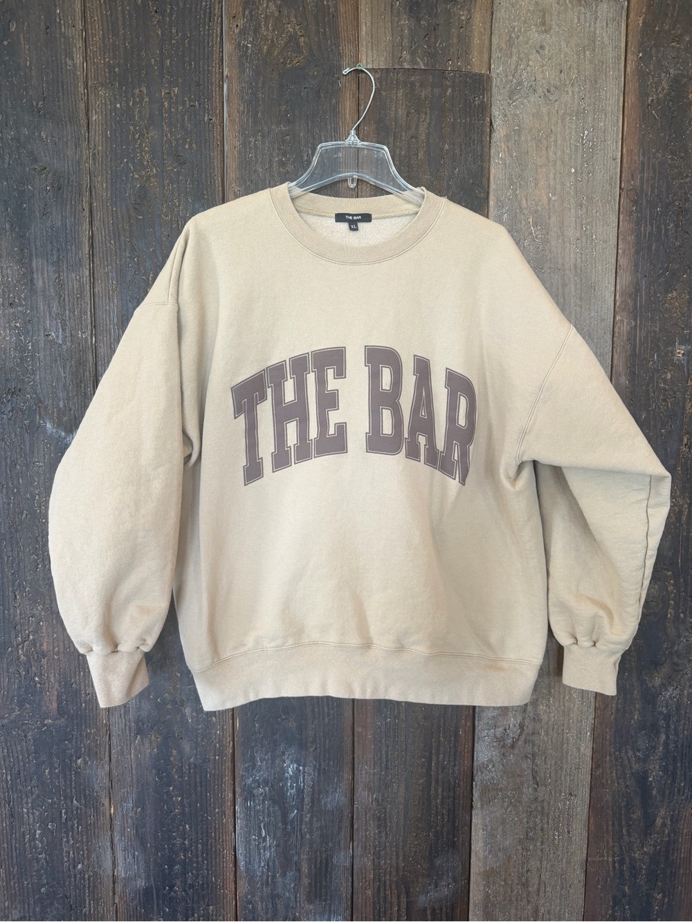 The Bar Varsity Crew Sweatshirt
Chocolate Chip Brown Logo Size XL